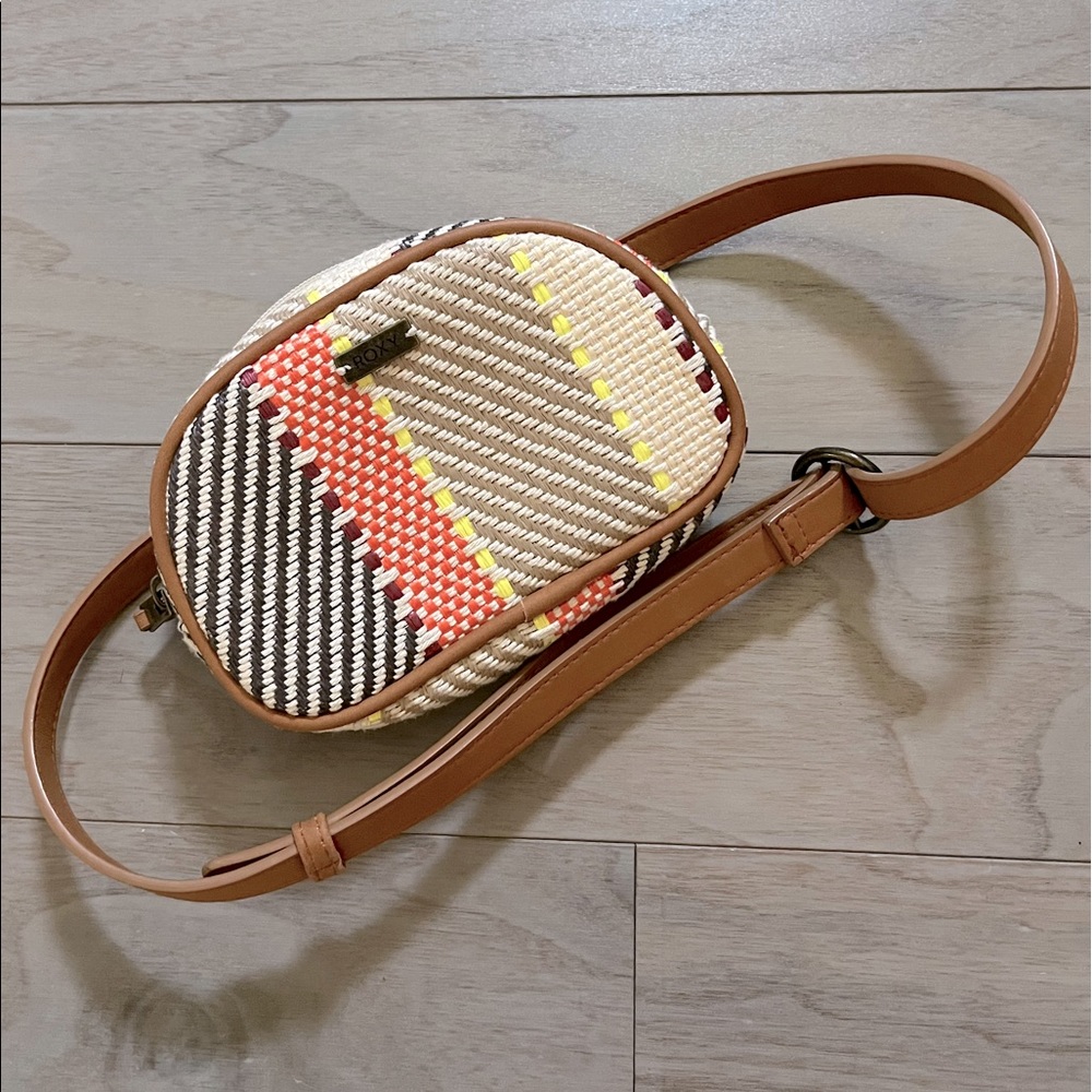 Roxy waist purse with belt. Used but still has some life left.
